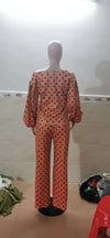 Polka Dot Printed Long-sleeved Trousers in orange with lantern sleeves, loose fit.