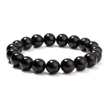  Black Onyx BraceletExperience the power of the Black Onyx Bracelet. Made with an imported elastic cord and featuring 8MM geometric black agate beads, this bracelet is not just stylish BraceletPlush Fashions ShopPlush Fashion ShopBlack Onyx Bracelet