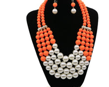  Multi Simulated Pearl Bohemian Jewelry Set with orange beads and faux pearls on display bust.