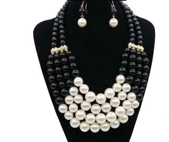 Multi Simulated Pearl Bohemian Jewelry Set with necklace and earrings on display bust.