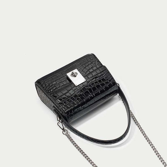 Leather handbags portable diagonal bag in black crocodile pattern with a single shoulder strap and metallic chain detail.