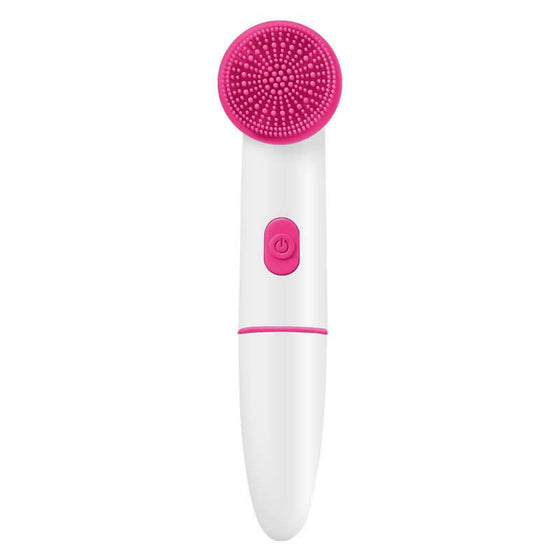 Electric silicone facial cleanser in pink with 360° cleaning brush.