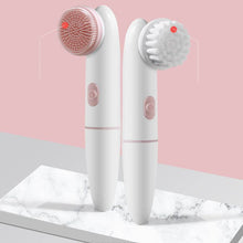  Electric silicone facial cleanser and cleansing brush on a marble surface.