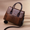 Ladies tote shoulder messenger handbag with crocodile pattern in brown PU leather.