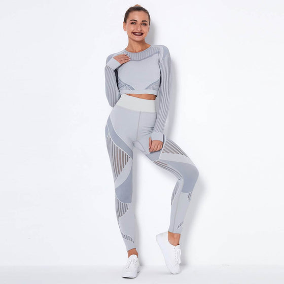 Seamless Knitted Absorbent Yoga Long-Sleeved SuitExperience ultimate comfort and style in this Seamless Knitted Absorbent Yoga Long-Sleeved Suit. The breathable fabric, consisting of 70% nylon, 20% polyester, and 1Yoga SetPlush Fashions ShopPlush Fashion ShopSeamless Knitted Absorbent Yoga Long-Sleeved Suit