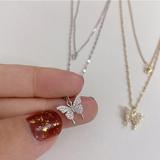 Elegant silver double layer butterfly necklace with clavicle chain, perfect for ladies' fashion.