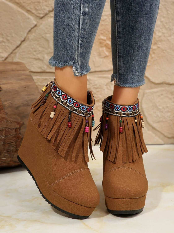 Fringe Suede Wedge Boots with beaded accents and high heel.