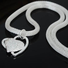  Fine Jewelry Silver Net Style Heart NecklaceFall in love with our Fine Jewelry Silver Net Chain Heart Necklace! This Korean style necklace is made with environmental protection copper and plated with thick silChainPlush Fashions ShopPlush Fashion ShopFine Jewelry Silver Net Style Heart Necklace