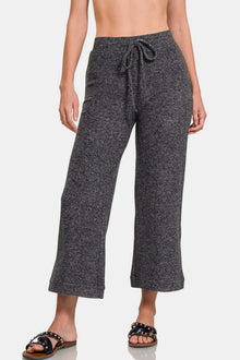  Zenana Drawstring Hacci Cropped Pants in black with pockets and a relaxed fit.