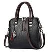 Ladies luxury crossbody handbag with soft surface, zipper opening, and spacious compartments.