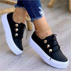 Flats sneakers women rivet casual shoes with lace-up design and trendy rivet detailing.