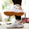 Men's breathable mesh sports sneakers with EVA sole in white and orange design.