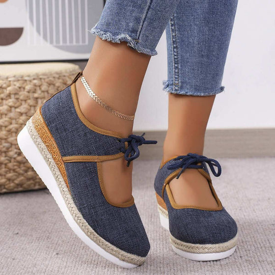 Tied Cutout Wedge Slip-OnsStep into style and comfort with our Tied Cutout Wedge Slip-Ons! Made with high-quality elastomer and polyester materials, these mid heel shoes are perfect for any oShoesPlush Fashion ShopPlush Fashion ShopTied Cutout Wedge Slip-Ons