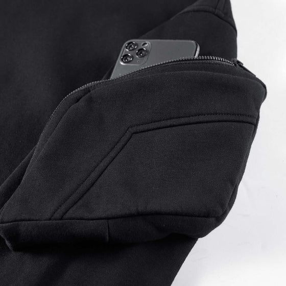 Men's Spring and Autumn Wind Mask Hoodie pocket detail with smartphone, showcasing functionality and style.