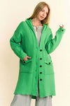 Davi & Dani green hooded cardigan with side slits and button-up front.