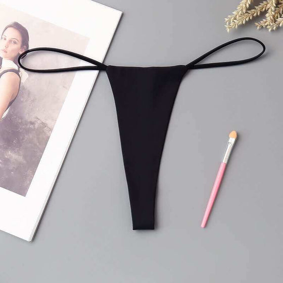 Minimalist low waisted underwear, black, polyester cotton blend, T-back style.