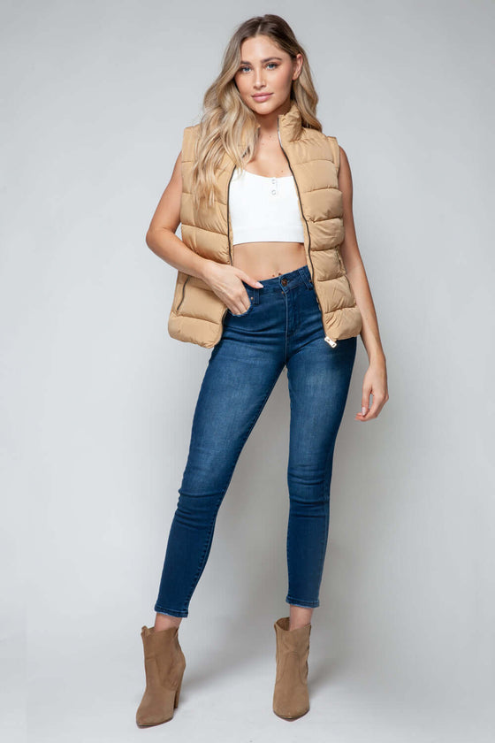 Snobbish Zip Up Turtleneck Vest with PocketsElevate your outfit with the Snobbish Zip Up Turtleneck Vest with Pockets. Designed with a convenient zip-up front closure and cozy turtleneck, this versatile vest oVestPlush Fashion ShopPlush Fashion ShopSnobbish Zip