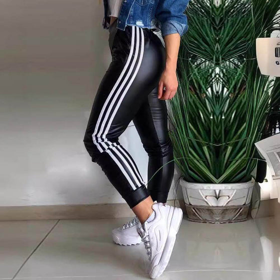 Women's PU side ribbon stitching casual trousers with high-waisted design.