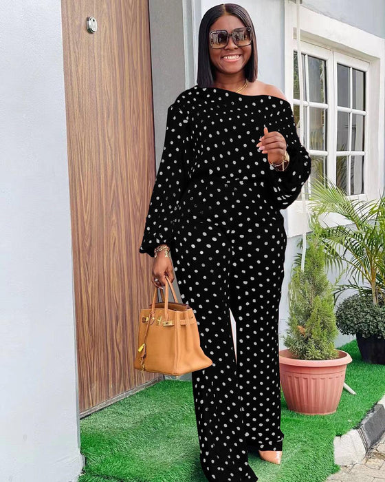 Polka dot printed long-sleeved trousers and loose shoulder suit in black.