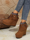 Fringe Suede Wedge Boots with decorative fringe and beaded accents, featuring high-quality suede and wedge heels for added height.