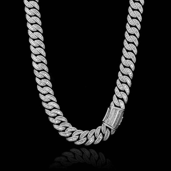 Miami Buckle Cuban Chain Bracelet with real gold plating against a black background.