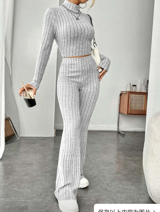 Long Sleeve Turtleneck Wide Leg High Waist Pants SuitThis stylish pants suit features a long sleeve turtleneck and wide-leg high waist pants, giving a chic and sophisticated look. Stay warm and on-trend while elongatin2 piece Pants setPlush Fashions ShopPlush Fashion ShopLong Sleeve Turtleneck Wide Leg High Waist Pants Suit