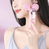 Face Slimming Roller Vibration Facial Beauty in use, cherry blossom powder color.