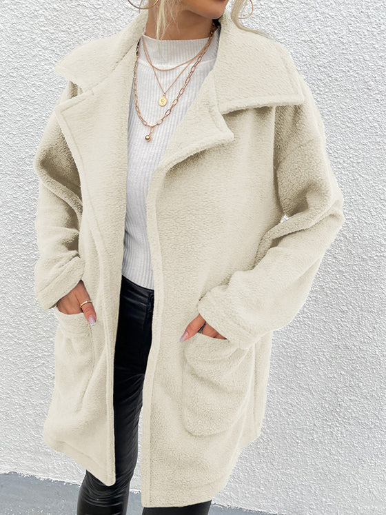 Shiny cream dropped shoulder coat with pockets, 100% polyester.