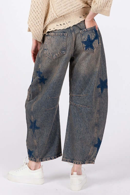 Women's Star Wide Leg Jeans with pockets and star design in 100% cotton.