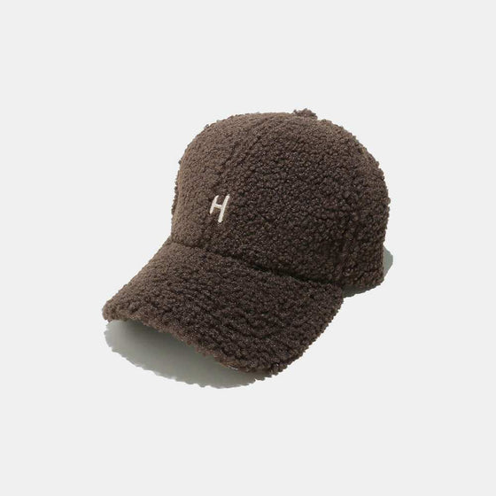 Sherpa Letter H Embroidered CapAdd a touch of style and personality to your wardrobe with our Sherpa Letter H Embroidered Cap! Made from high-quality polyester, this imported cap features a 2.8 inHatPlush Fashion ShopPlush Fashion ShopSherpa Letter