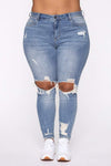 Plus size stretch ripped women jeans, high waist, trendy street style.