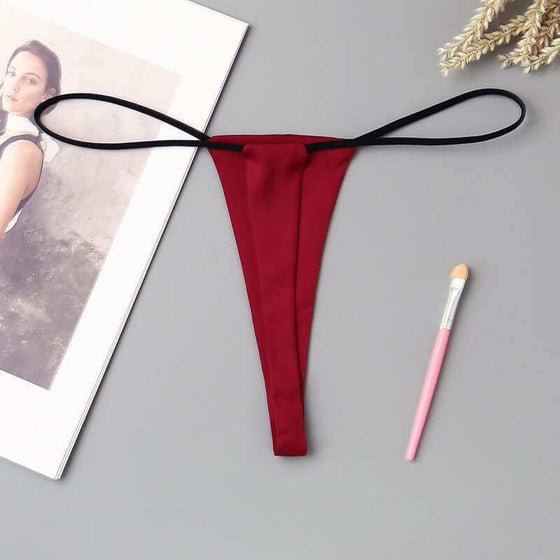 Minimalist low waisted underwear in wine red with T-back style.