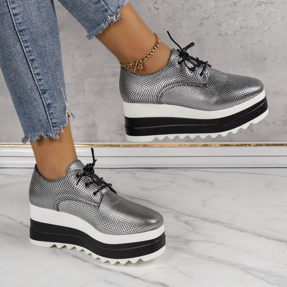 Round toe lace-up platform thick bottom shoes for women in silver with flatform heel and cross-tie straps.