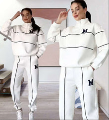  Women's white pullover sweatsuit set with stylish stripes and pockets, perfect for cozy and chic lounge wear.