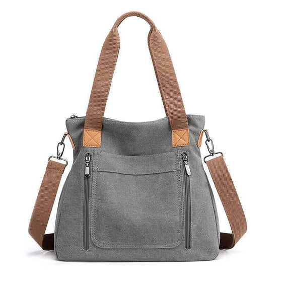 Women Large-capacity Canvas Casual Shoulder BagsBe stylish and organized with our Women's Large-capacity Canvas Casual Shoulder Bags. Made with soft canvas fabric, this bag is perfect for business or casual outingHandbagsPlush Fashions ShopPlush Fashion ShopWomen Large-capacity Canvas Casual Shoulder Bags