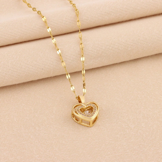 Double-layer gold chain heart pendant titanium steel necklace.