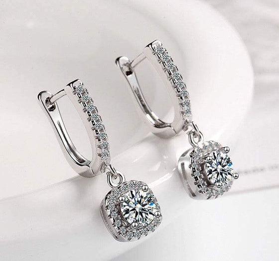 Diamond Inlaid Short Hollow Zircon Earrings with copper-white gold plating and sparkling shine.