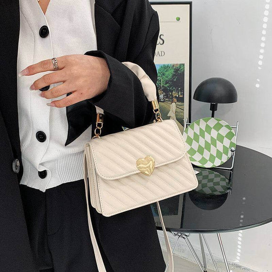 Women handbags with fashion chain and love metal design in white PU material.