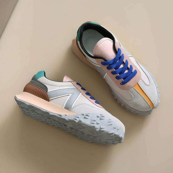 Casual Women Light Running Shoes with striped pattern and colorful design.