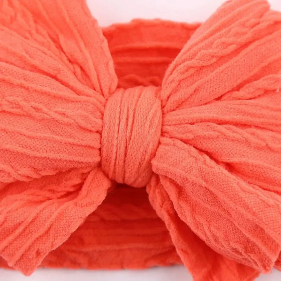 Newborn Solid Cable Baby Bow Headband for ChildEnhance any outfit with our Solid Cable Bow Baby Headband! Stretchy, soft Nylon material won't hurt your baby's head and will grow with them. Available in 20 colors,HairbowsPlush Fashions ShopPlush Fashion ShopNewborn Solid Cable Baby Bow Headband