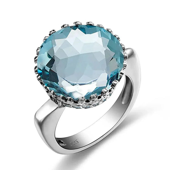 925 sterling silver ring with 15ct round created aquamarine stone.