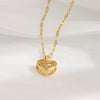 Gold chain with heart-shaped pendant made of titanium steel.