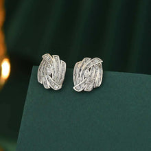  Elegant micro zircon stud earrings in electroplated silver with geometric design.