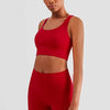 Plush sports accessories two-piece yoga suit in Chinese red with a cross-backless bra and cropped pants.