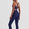 Plush sports accessories yoga suit with cross-backless bra and cropped pants in Night Sea color.