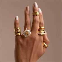  Hand wearing Cosmic Constellation Ring – Celestial Star Sign Jewelry, gold and white.