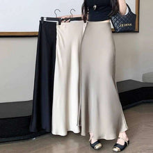  Fashion Skirt Women's Mid-length High Waist Sheath in champagne, brown, and black hanging on a rack.