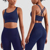 Plush Sports Accessories Yoga Suit in Night Sea, featuring a cross-backless bra and cropped pants, made with moisture-absorbing Spandex.