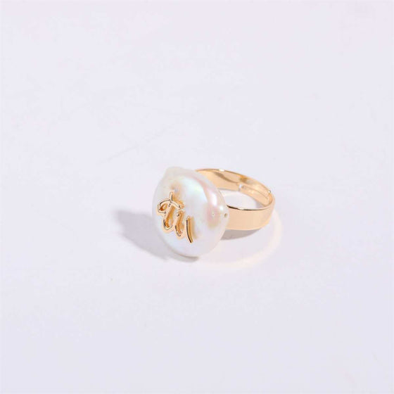 Cosmic Constellation Ring – Celestial Star Sign Jewelry in gold with pearl design.