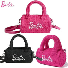  Women Fashion Pillow Barbie Hand Bags, pink and black cylindrical bags with unique design.